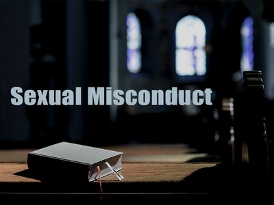 Bible on kneelers in church sanctuary w/ text "Sexual Misconduct"