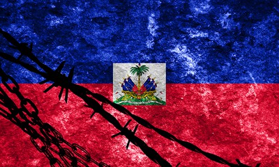 Image of Haitian Flag with shadow of barbed wire and chains.  Adobe Stock#103985573