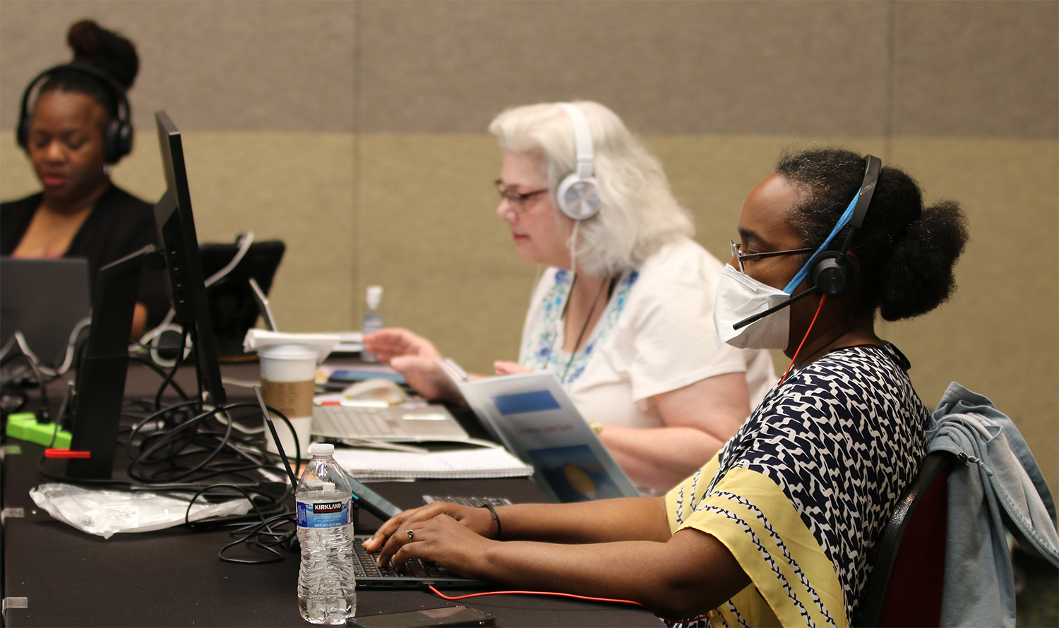 Ordination committee resource coordinator Alicia Demartra-Pressley (front), committee assistant Susan Trigger (middle), and vice-moderator Sonya McAuley-Allen (back) convene the final day of committee meetings on June 27, 2024.