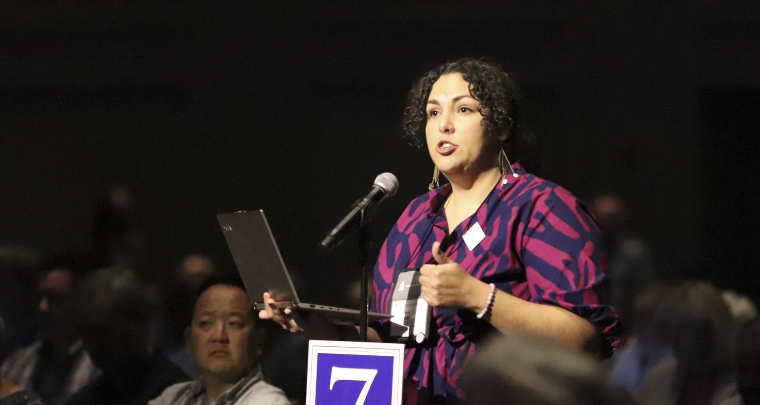 Anna Kendig Flores, resource person for the General Assembly Committee on Representation, responds to questions during the 10th plenary meeting on July 3, 2024.