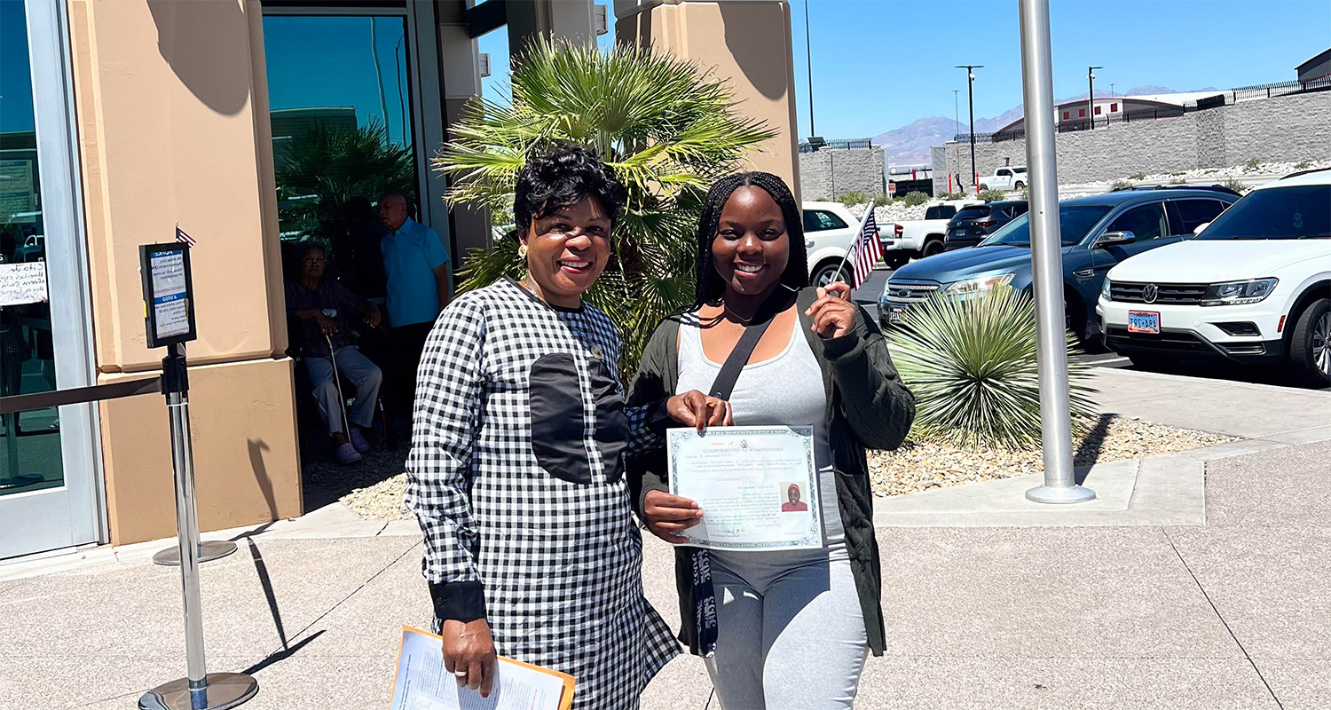 Sarah Mibulano, with mother Louise, shows off her citizenship certificate. (Contributed photo)