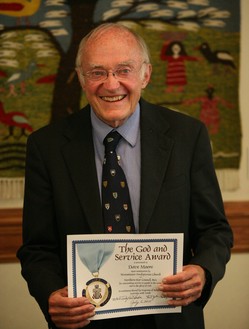 Photo of Dave Moore receiving an award