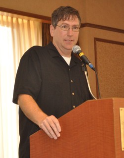 Photo of a man at a podium