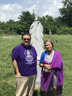 Ivy Porter and Jo Ann Kauffman visit gravesite of Speaking Eagle
