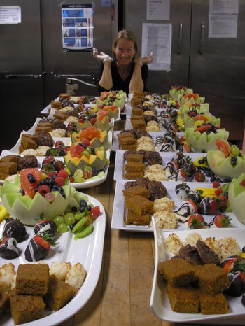 Woman smiling in front of desserts