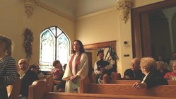 The Rev. Elizabeth Campbell-Maleke presides over a Scottish Heritage Service at First Presbyterian Church of Williamstown, W.Va. Campbell-Maleke came to the church through the Small Church Residency Program.