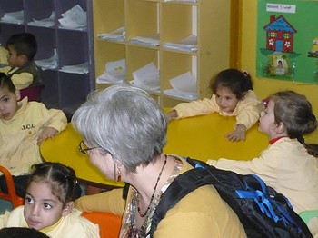 Elmarie Parker visits with Palestinian students attending a school sponsored by the Joint Christian Committee in Beirut, Lebanon.