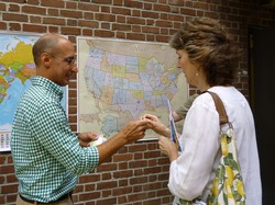 Mike Porter, Coordinator of Abbots/MAGs (Mission Affinity Groups), for the Fellowship Community, invited participants during registration to place a dot on their hometown on the U.S. or world map.