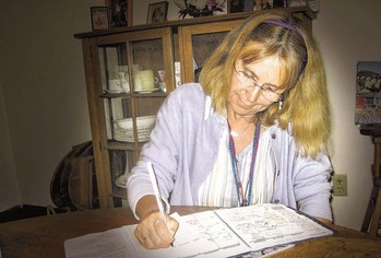 The Rev. Cynthia Huling Hummel, of Elmira, who suffers from a degenerative brain disorder, makes lists to help her remember important things.