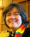 Headshot of the Rev. Carolyn Winfrey Gillette, wearing multicolored vestments.