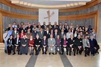 Members of the Fellowship of the Middle East Evangelical Churches grouped together for a photo.