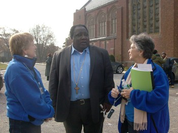 The Rev. Benjamin Patterson (center), pastor of First Presbyterian Church in Far Rockaway, discusses Hurricane Sandy relief needs with PDA National Response Team members Helen Robinson (left) and Donna Melloan (right).