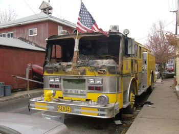 A fire engine in Breezy Point, destroyed when flood water shorted out its electrical system and set it ablaze.