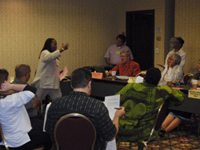Cynthia White, coordinator of SDOP, led the National Committee in a role-playing exercise.