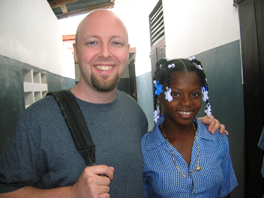 Barnabas Sprinkle with a Haitian girl