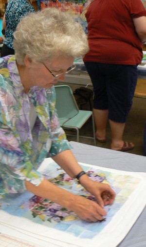 Mary Phillips working on a quilt
