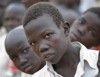 Children line up before class in a school in the Ajuong Thok Refugee Camp in South Sudan.