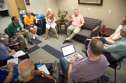 Chip Hardwick, director of Theology, Formation and eEducation, speaks about new worship resources with a breakout group at the mid-council meeting held prior to Big Tent 2015.