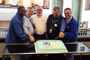 (Left to Right) Alonza Washington, Bob Houser, Rick Turner, Bill Neely and Jim Kirk - original members of the team known as PDAT - cut a cake commemorating the 20th anniversary of the PDA National Response Team.