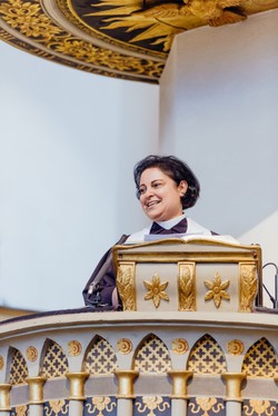 The Rev. Najla Kassab of the Evangelical Church of Syria and Lebanon preaches from the Wittenberg pulpit where Martin Luther preached at the onset of the Protestant Reformation.