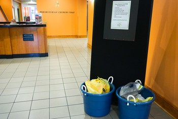 PDA collection buckets in the lobby of the Presbyterian Center in Louisville.