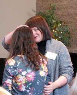 Lesley Abrams leads a Renewal of Baptism liturgy