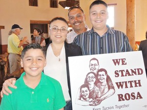 Rosa Robles Loreto (second from left) stands with her family in the kiva (sanctuary) at Southside Presbyterian Church. From left are José Emiliano, 9, Rosa, Gerardo Grijalva Sr. and Gerardo Jr., 12.