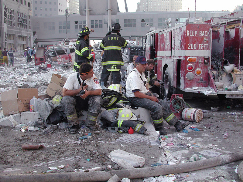 New York City firefighters take a much needed break during emergency response efforts following the 9/11 attacks. (U.S. Army Corps of Engineers file photo - Public Domain)