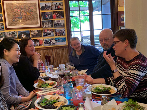 Several students and staff of San Francisco Theological Seminary continued the conversation with the Rev. Cindy Kohlmann over a meal. Photo by Scott Clark. 