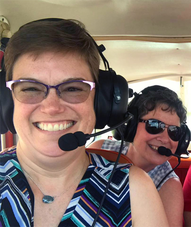 The Reverend Cindy Kohlmann joins a group for an aerial tour of some of Louisiana’s marshes that are disappearing because of climate change and human involvement. Photo provided.
