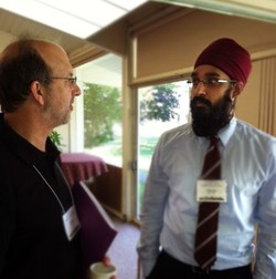 Simran Jeet Singh (right), executive director of the Sikh Spirit Foundation; spoke with David Leslie, executive director of Ecumenical Ministries of Oregon. 