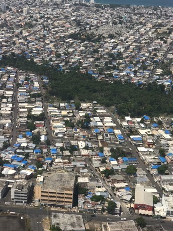 Thousands of homes across Puerto Rico still have blue tarps on the roofs a year after Hurricane Maria. 