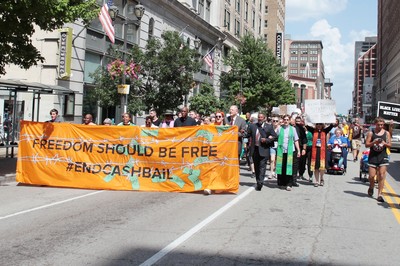 Presbyterians and other supporters took part in a cash bail out in St. Louis during the 223rd General Assembly in June. 