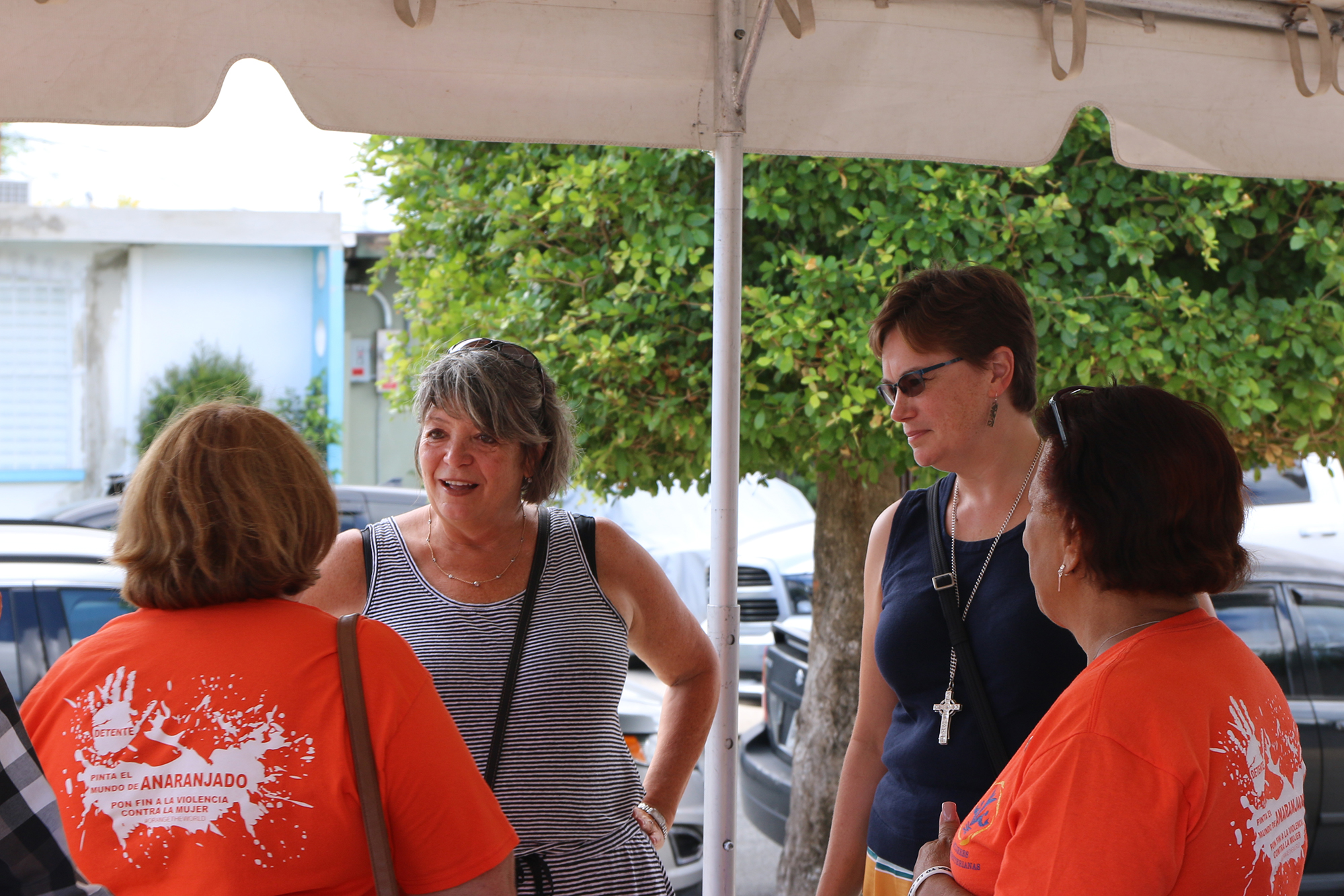 PDA Director, Rev. Dr. Laurie Kraus and Rev. Cindy Kohlmann, Co-Moderator of the 223rd General Assembly (2018) of the PC(USA), meet with volunteers at Bayamón Presbyterian Church. Photo by Rick Jones.
