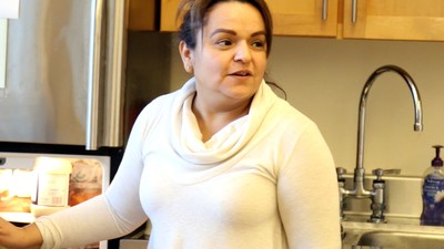 Leonor Garcia in the kitchen of Forest Hill Church, where she was welcomed to enter into sanctuary.