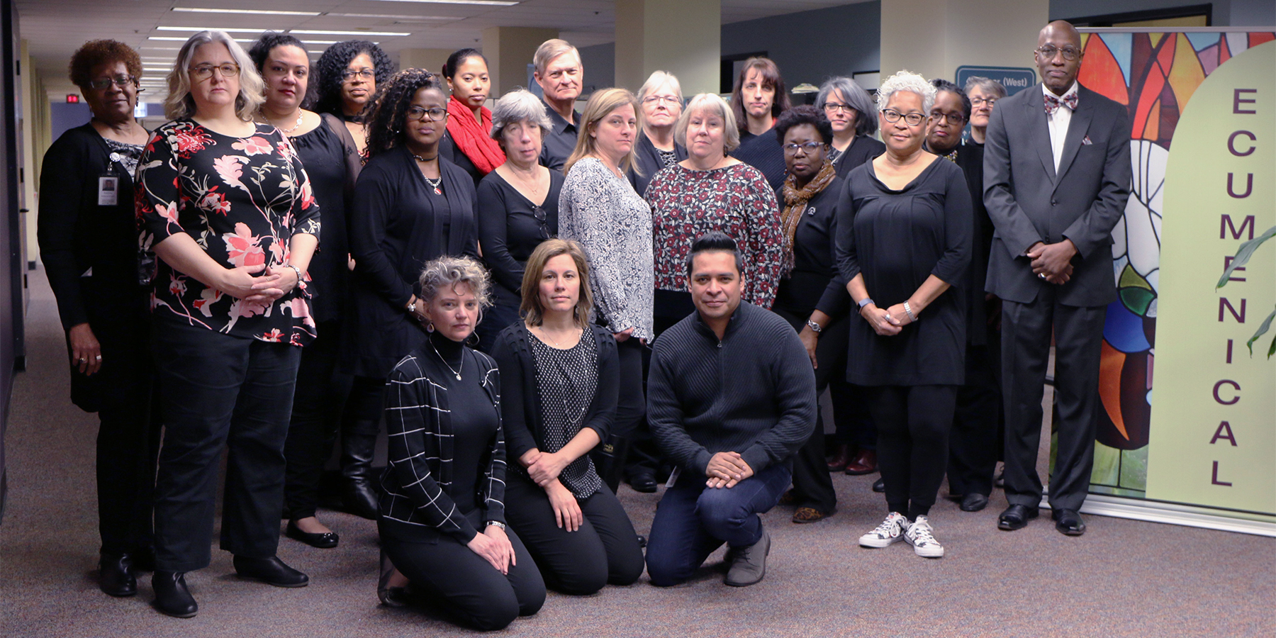 Office of the General Assembly staff dress in black to commemorate the “Thursdays in Black Campaign” to raise awareness of the abuse of women. Photo by Randy Hobson.