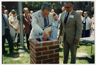 Depositing items in the time capsule, Summer 1989.