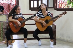 Spanish guitar is one of the musical genres taught in the youth music program at the Toyos Mission. 