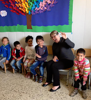 Image of Co-Moderator Jan Edmiston with Children While Visiting Syria in March 2017