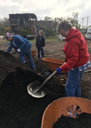 Hands & Feet group from the Presbytery of East Iowa assist at Global Farms where immigrants and refugees learn about agriculture in the Midwest.