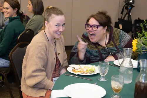 Rev. Karen Rohrer talks with another leader at 1001 NWC gathering
