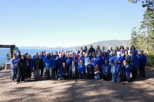 Group picture in front of a big, blue sky