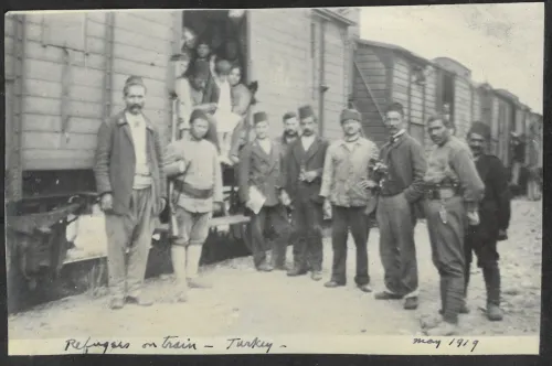 A group of refugees from Armenia that have taken a train to Turkey in 1919.