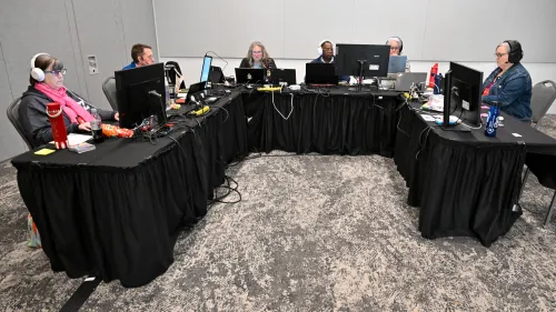 Theological Education & Ordination committee leaders and supporting staff guide the first day of meetings at GA227 in Milwaukee. Photos by Rich Copley.