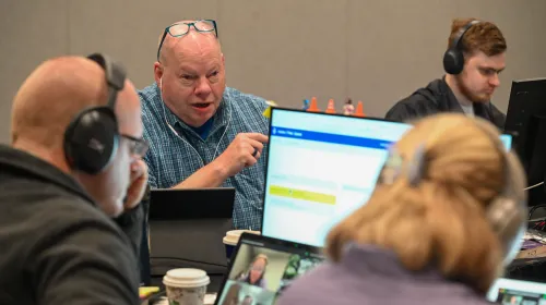 GA227 Constitutional Interpretation Committee leadership team members talking amongst themselves