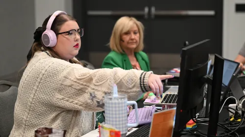 The RIW Committee leadership team members work through the last items of business on June 24. 
