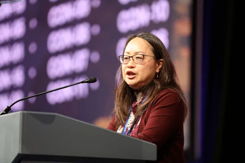 The Rev. Jihyun Oh offered an apology during the 5th plenary of the 227th General Assembly. Photo by Jim Deweese. 