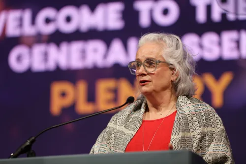 Theological Education & Ordination Committee moderator, Charlotte Lohrenz, began reporting the committee's work to the 227th General Assembly on June 29. Photo by Jim Deweese. 