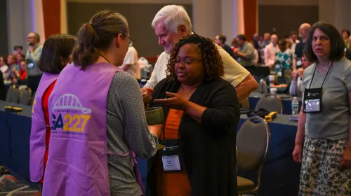 GA227-person receiving communion