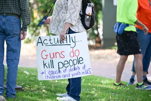 Handmade sign brought to the walk to end gun violence. The in-person portion of GA227 began with Healing Not Harm: A Walk to End Gun Violence, which went from Pere Marquette Park to Milwaukee City Hall on June 27, 2026.